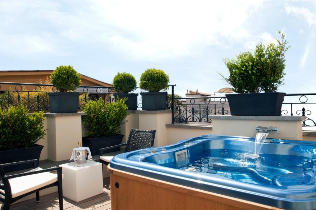 The First Arte Roma Preferred Hotels & Resorts con Vasca Idromassaggio in Terrazza The First Arte Roma Preferred Hotels & Resorts con Vasca Idromassaggio in Terrazza